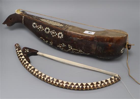 An Ottoman musical instrument and bow 54cm long